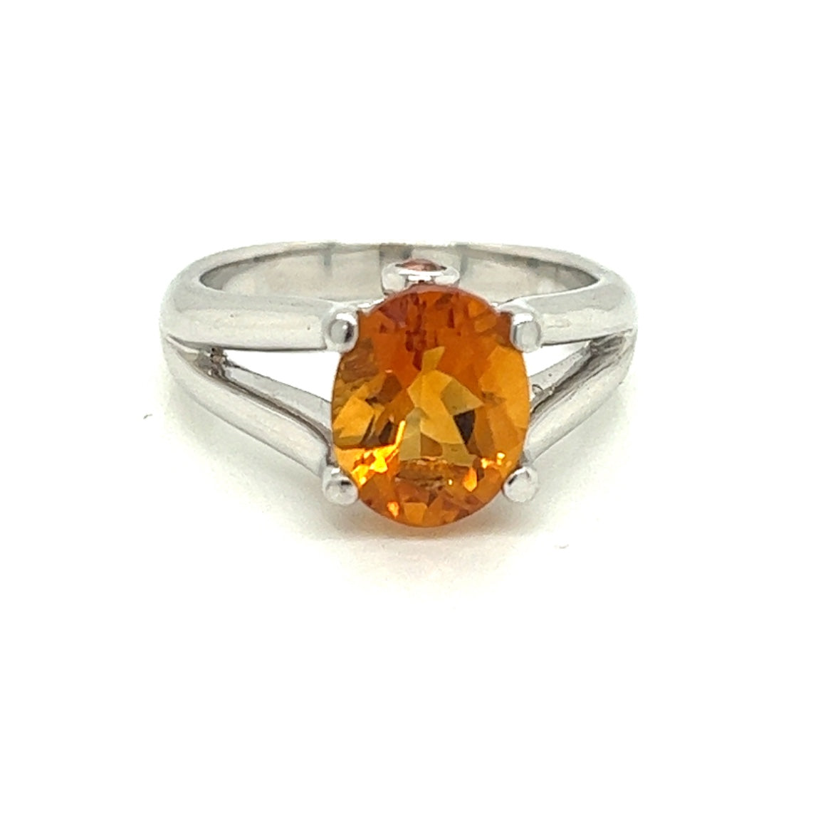 Oval Citrine Gemstone  With Two Bezel Set Orange Sapphire Gemstones Set On The Side