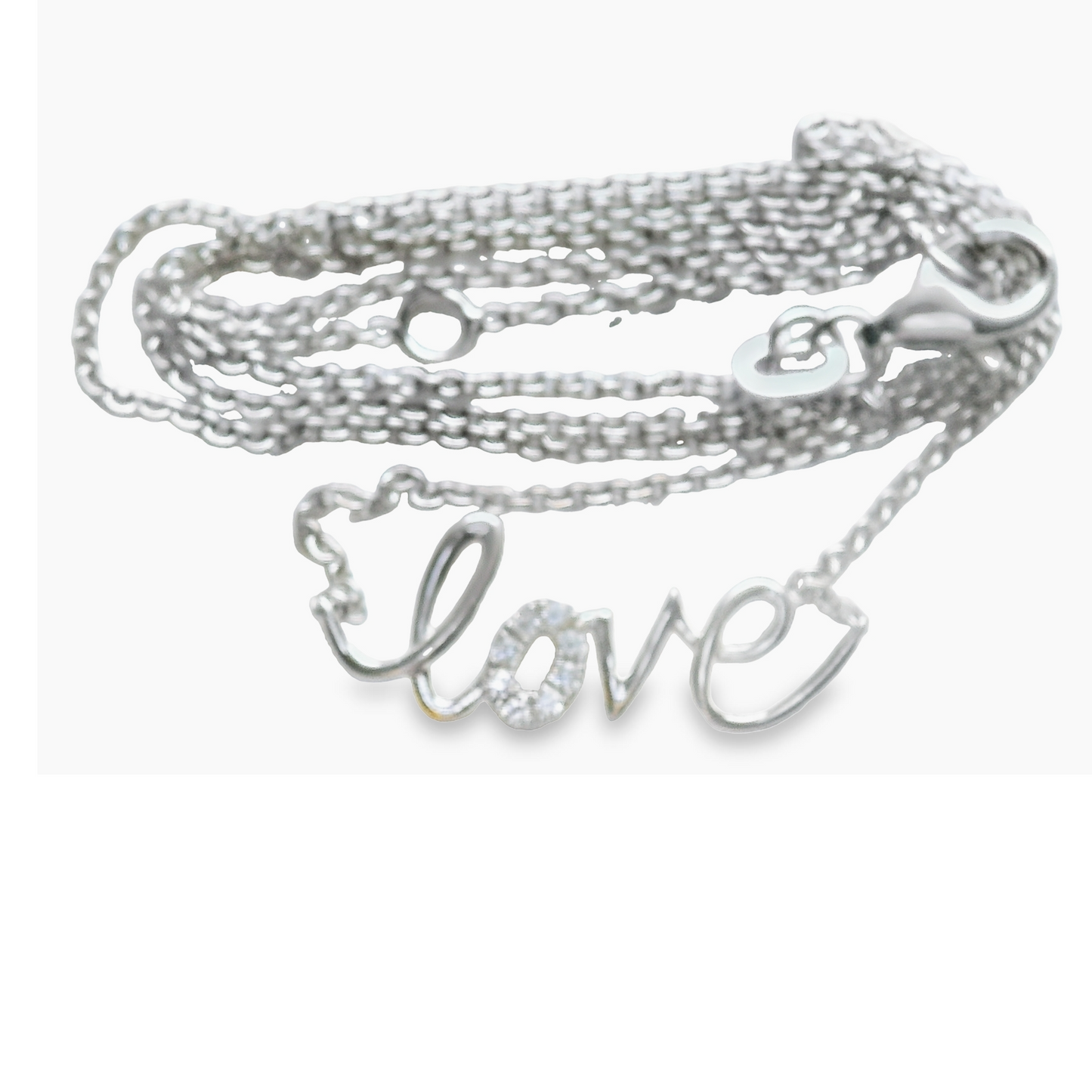 Thisi fun necklace is nothing but "Love" with diamonds set into the O.