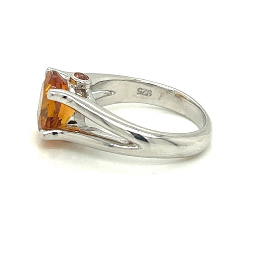 Oval Citrine Gemstone  With Two Bezel Set Orange Sapphire Gemstones Set On The Side