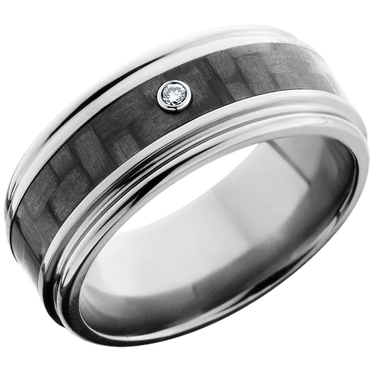 Titanium 9mm flat band with rounded edges and a 4mm inlay of black Carbon Fiber with a bezel-set white diamond accent