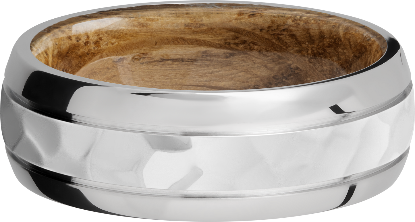 Cobalt chrome 8mm domed band with 2, .5mm grooves and a sleeve of Whiskey Barrel hardwood